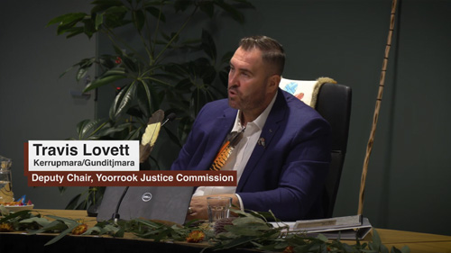 Close up of Deputy Chair of the Yoorrook Justice Commission Travis Lovett at a public hearing.